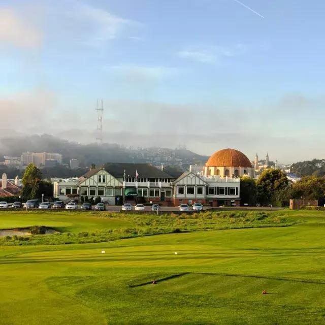 The greens of the Presidio Golf Course shine on a sunny San Francisco day.