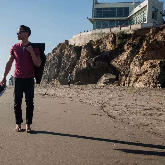 Nick Whittlesey barefoot on Ocean Beach
